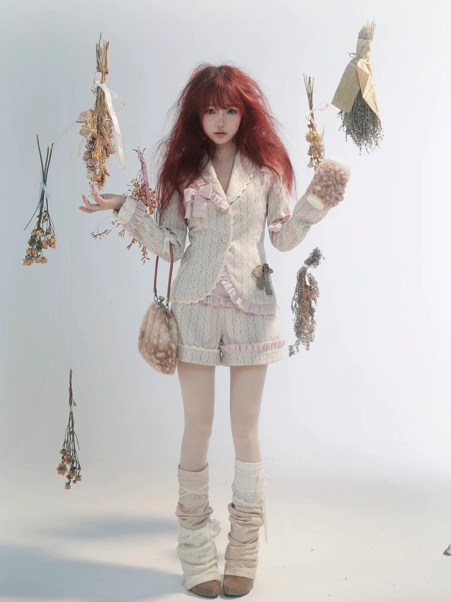 Rose Island Deer collection fawn pattern print faux fur handbag model holding as arm bag with matching suits whole view