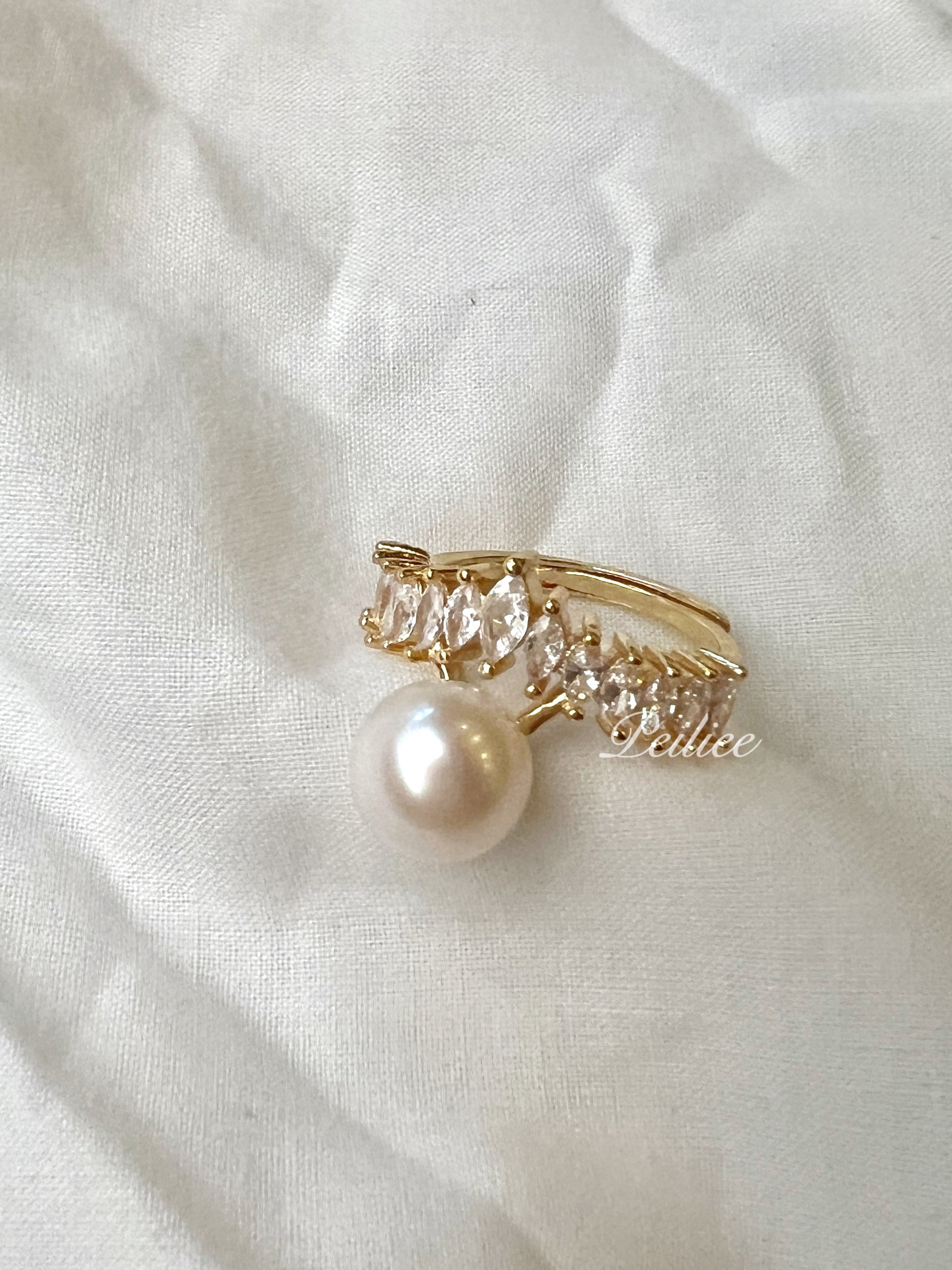 Get trendy with Love Me Like You Do Crystal 9-10mm Freshwater Pearl Ring - available at Peiliee Shop. Grab yours for $19.90 today!