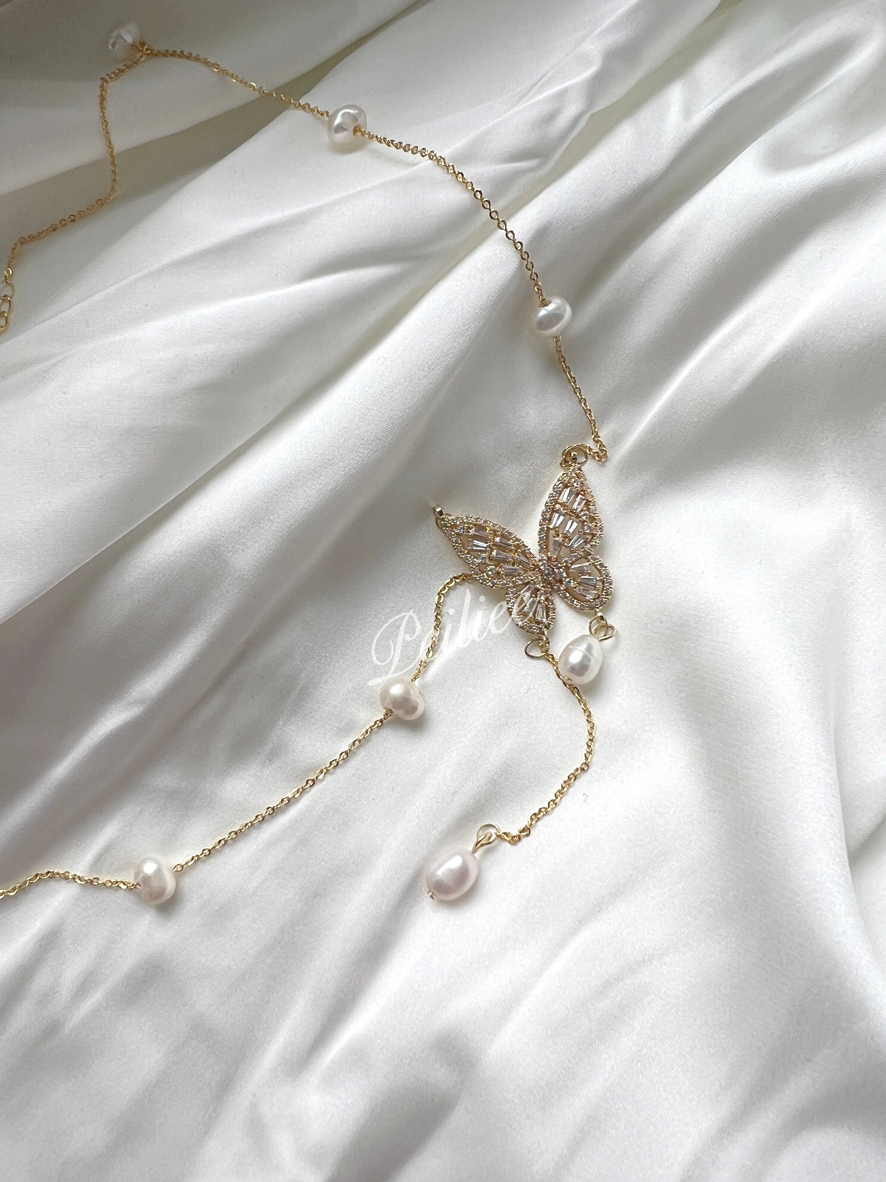 Get trendy with Butterfly dreams lucky charm freshwater pearl necklace - available at Peiliee Shop. Grab yours for $19.90 today!
