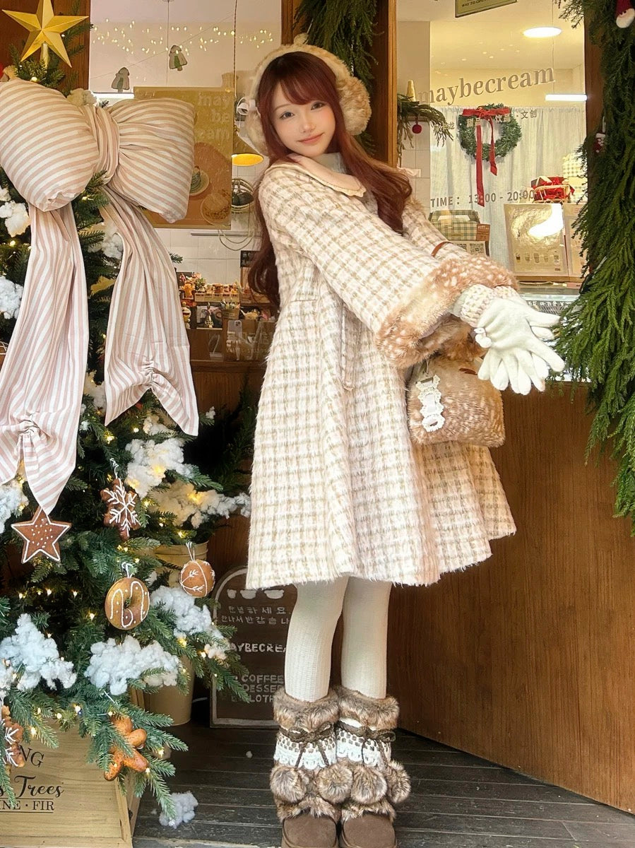 Girl in a plaid deer fawn print faux fur coat standing next to a decorated Christmas tree in a store in winter.