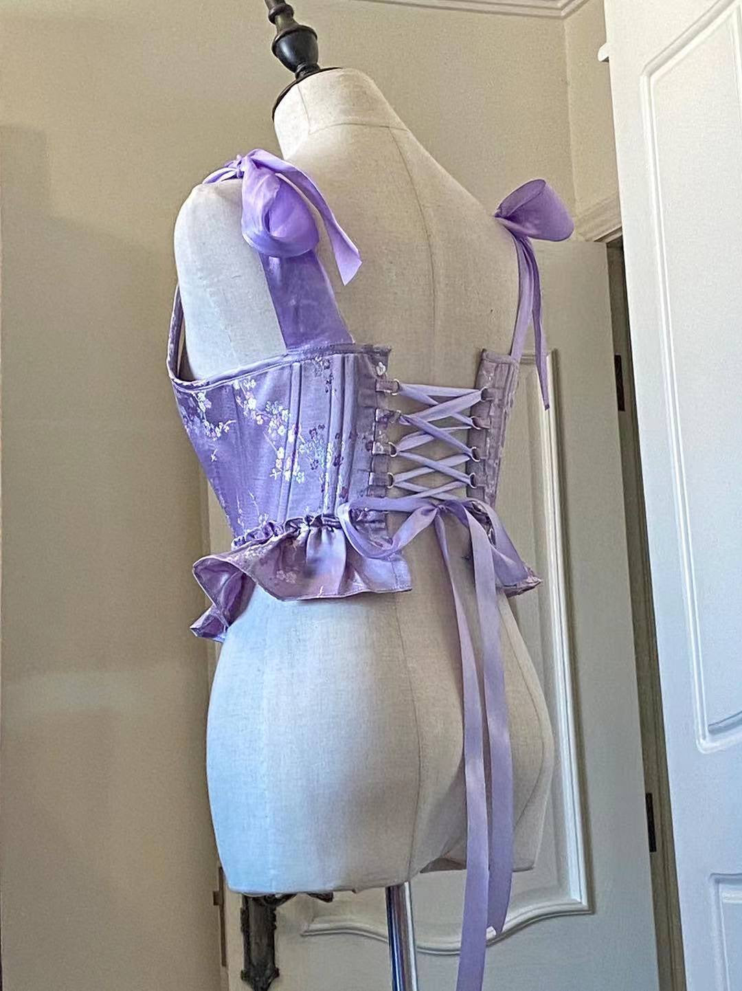 Get trendy with Lavender Dream Corset Handmade - Corset available at Peiliee Shop. Grab yours for $79.90 today!