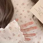 Get trendy with Floral Puff Cream Cake Cotton Shirt - Sweater available at Peiliee Shop. Grab yours for $16 today!