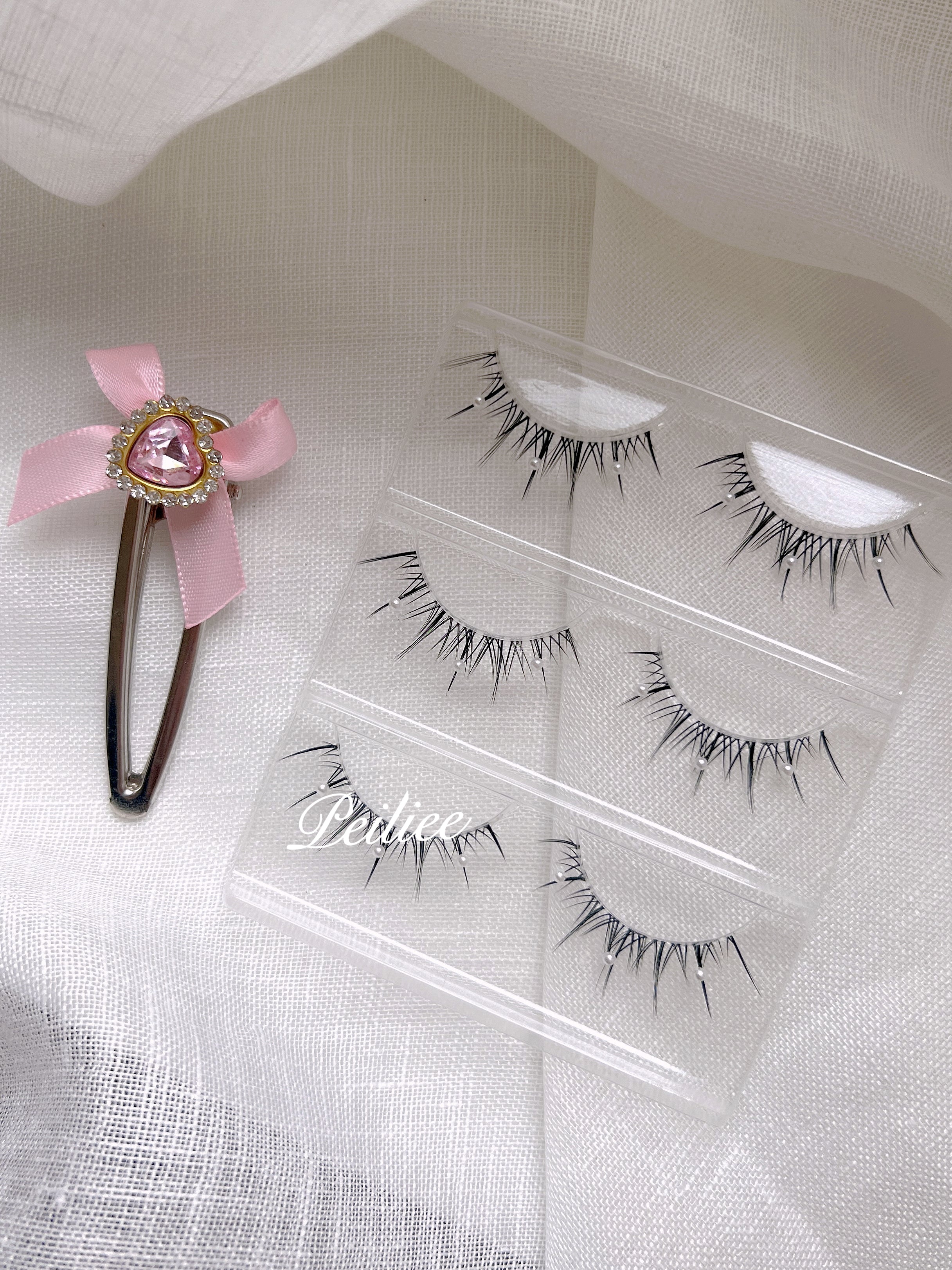 Get trendy with Mermaid Pearl Eyelashes 3 sets -  available at Peiliee Shop. Grab yours for $8.90 today!