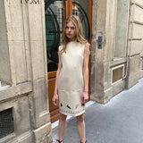UNOSA Beige Floral Silhouette Sleeveless H-Line Dress