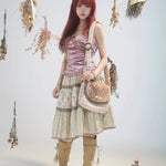 Rose Island Deer collection fawn pattern print bag wearing on one shoulder look