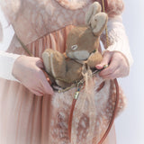 Rose Island Deer collection fawn pattern print faux fur handbag model holding with bunny doll inside