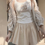 Get trendy with Doll Dream Cotton Mini Skirt with sweatshorts inside -  available at Peiliee Shop. Grab yours for $18 today!