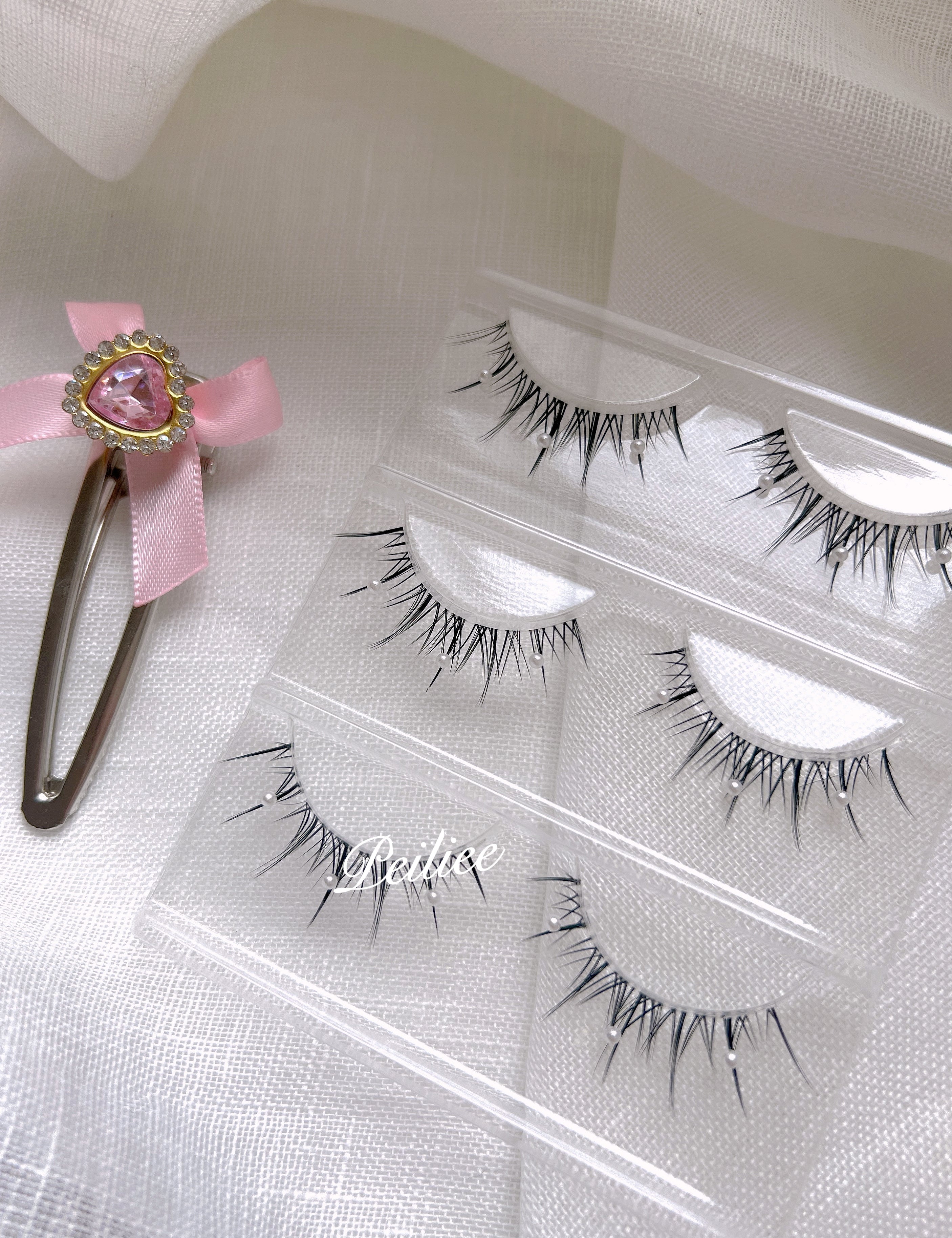 Get trendy with Mermaid Pearl Eyelashes 3 sets -  available at Peiliee Shop. Grab yours for $8.90 today!