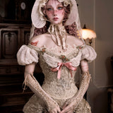 girl in a historical or vintage-style gothic fashion dress with lace details in an indoor setting.