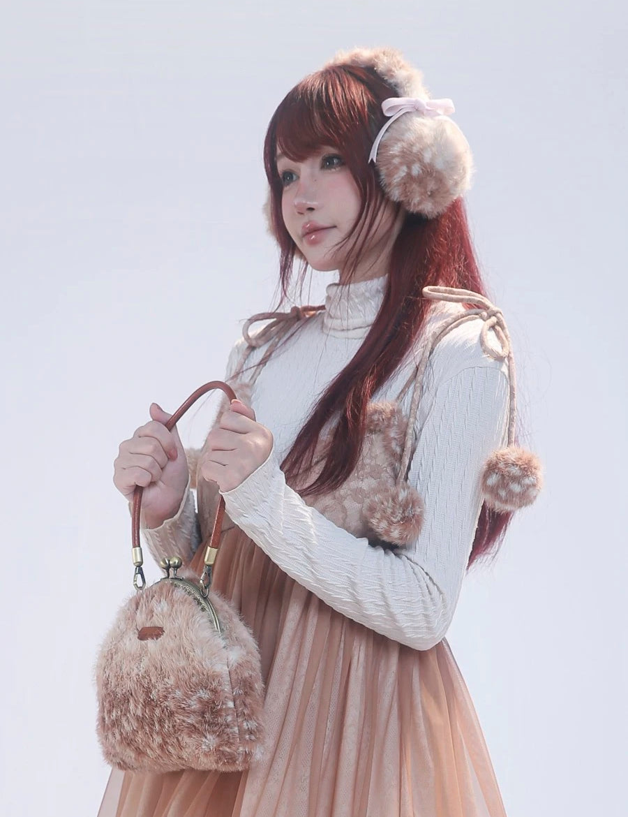 Rose Island Deer collection fawn pattern print faux fur handbag model holding 