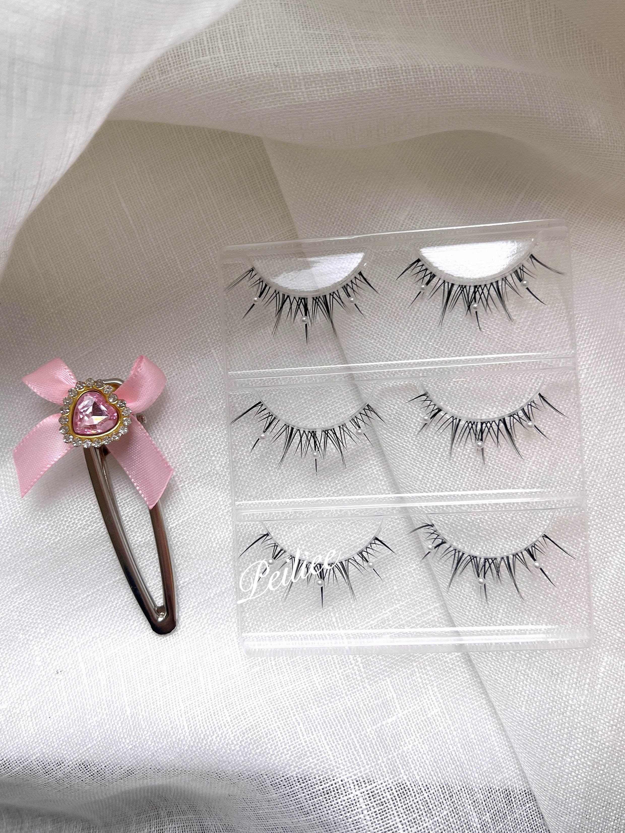 Get trendy with Mermaid Pearl Eyelashes 3 sets -  available at Peiliee Shop. Grab yours for $8.90 today!