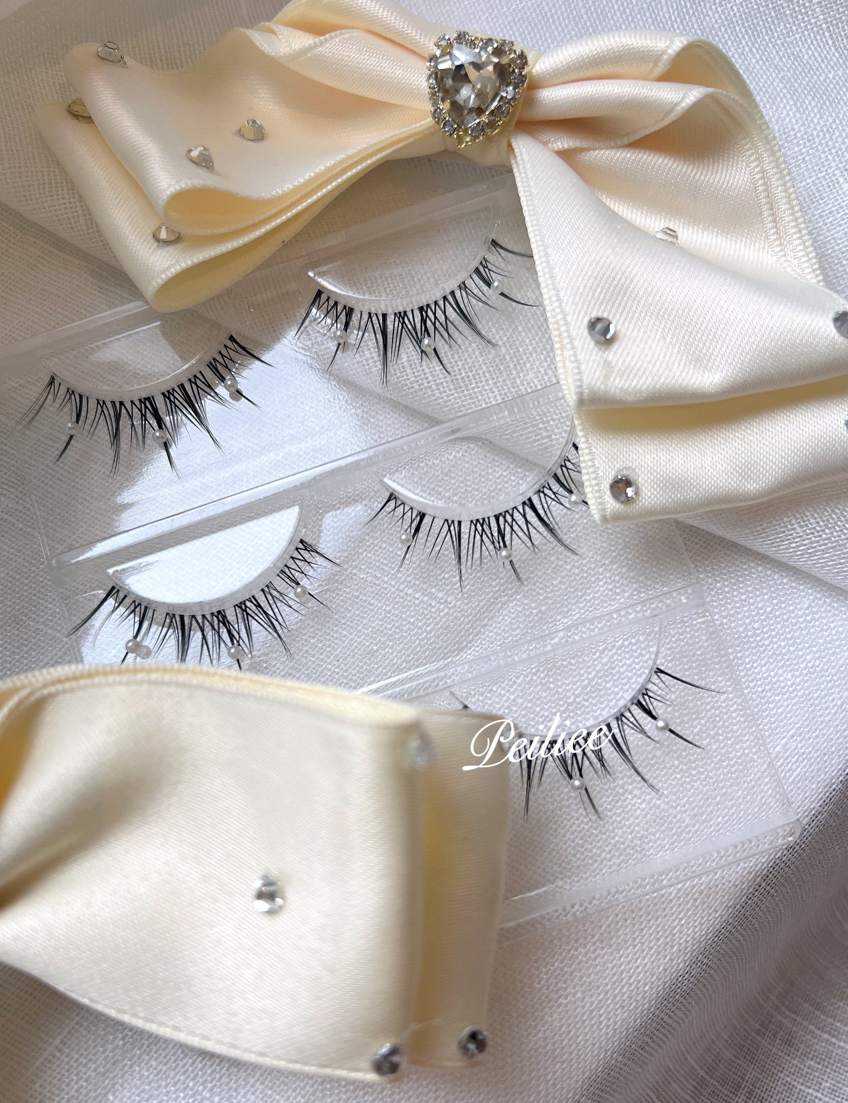 Get trendy with Mermaid Pearl Eyelashes 3 sets -  available at Peiliee Shop. Grab yours for $8.90 today!