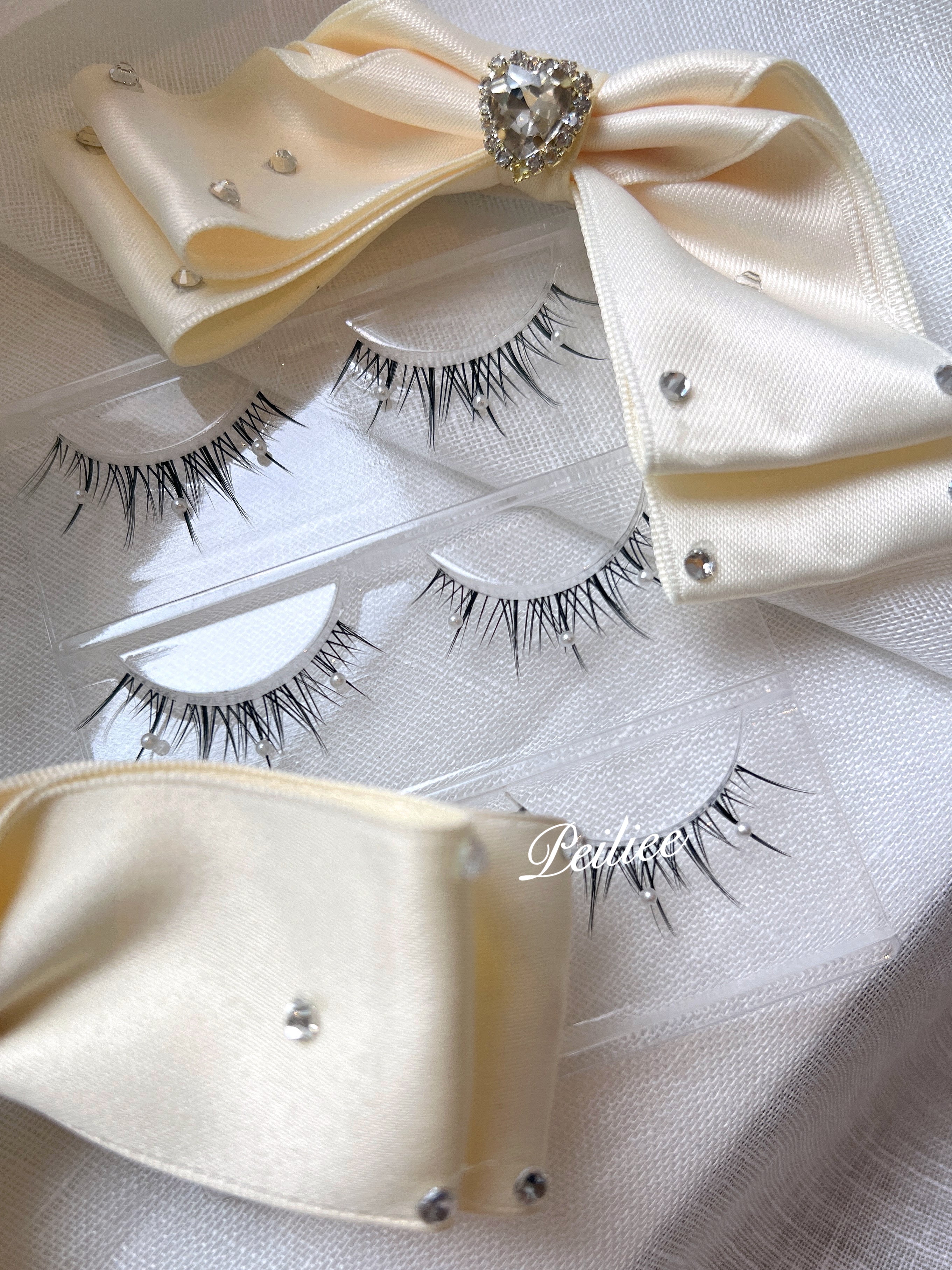 Get trendy with Mermaid Pearl Eyelashes 3 sets -  available at Peiliee Shop. Grab yours for $8.90 today!