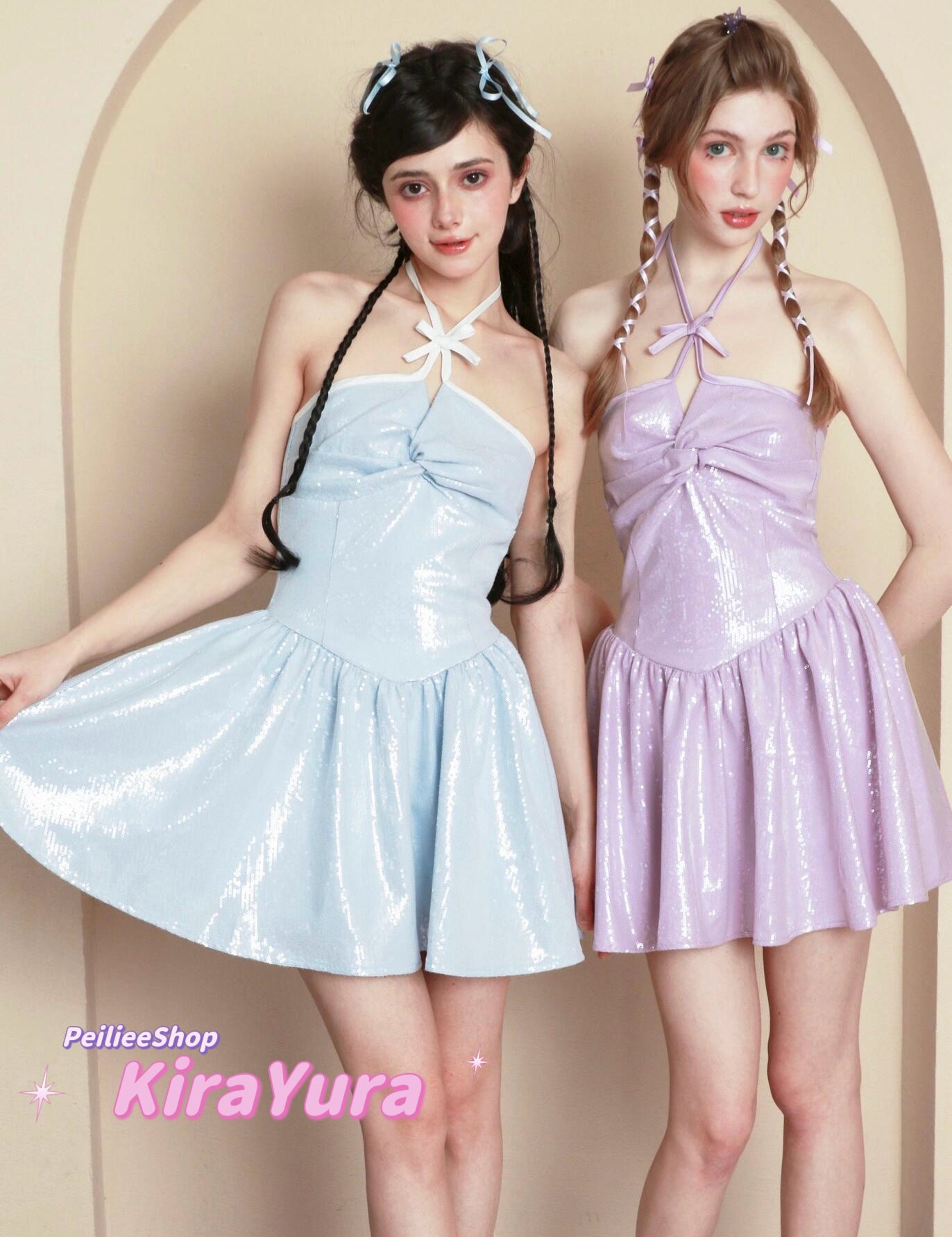Two women wearing light blue and pink harajuku glitter dresses with a beige background.