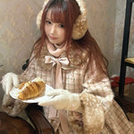 Woman in vintage outfit with faux fur fawn deer print coat and gloves holding a plate with bread.
