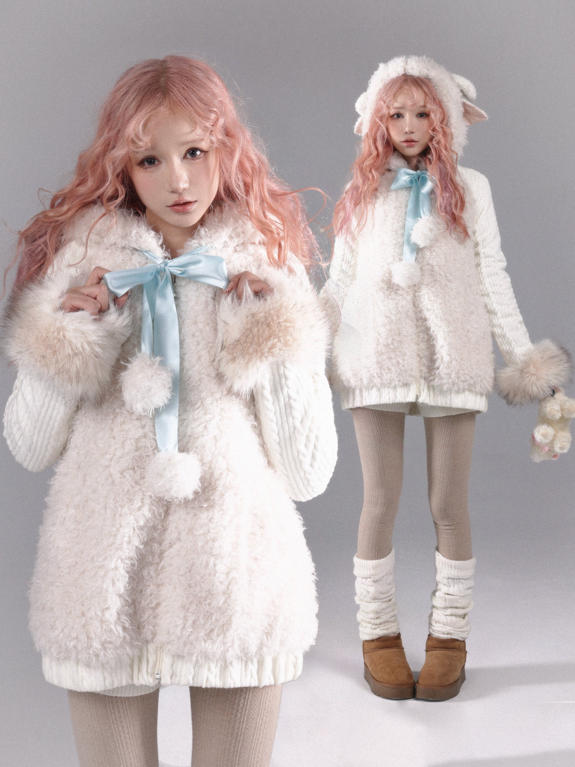 Two girls wearing matching outfits with fluffy white lamb sheep ear coats and light pink hair on a gray background.