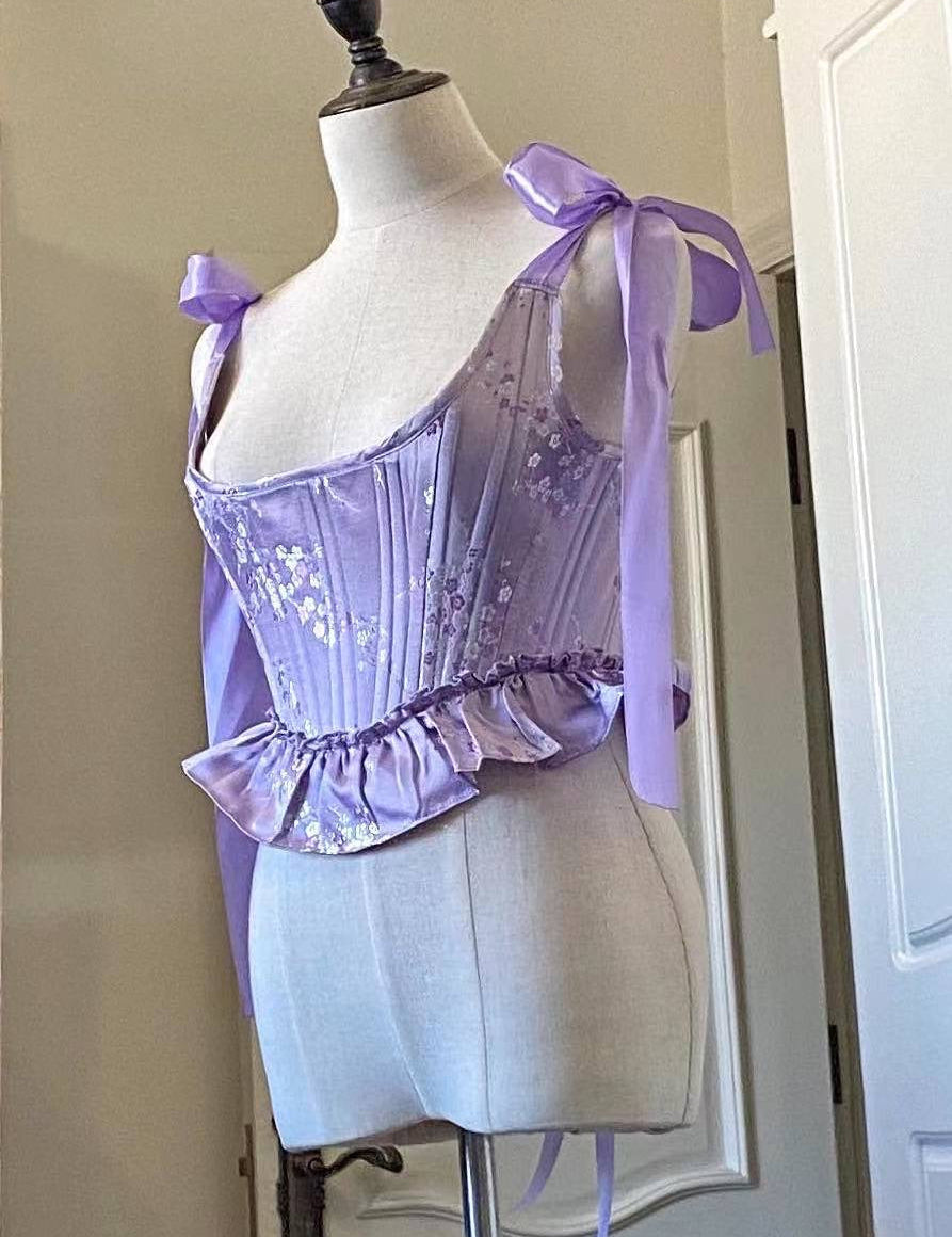 Get trendy with Lavender Dream Corset Handmade - Corset available at Peiliee Shop. Grab yours for $79.90 today!